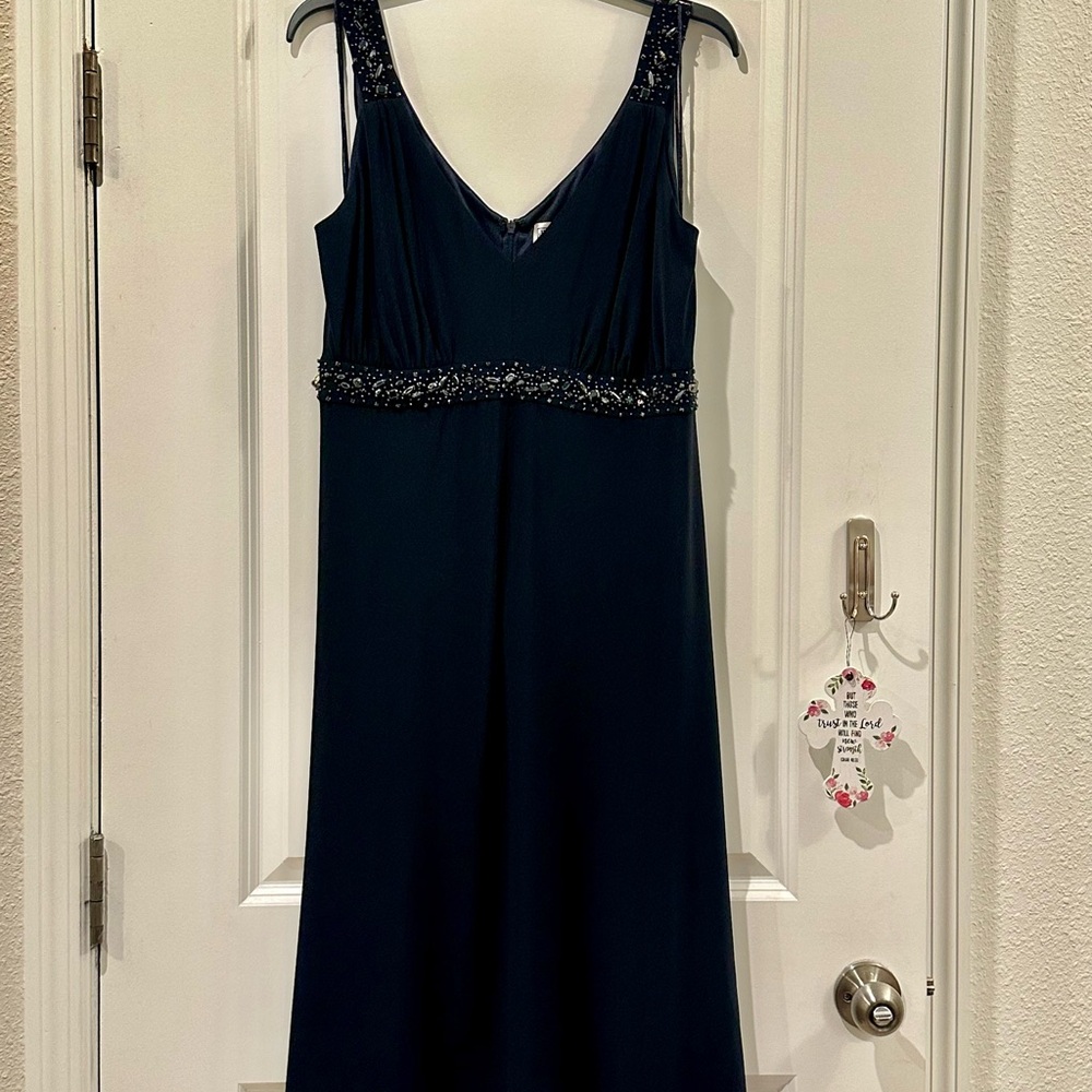Elegant Black Sleeveless Dress with Beaded Details